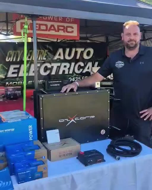 The City Centre Auto Electrical stand at the Queanbeyan 4WD and caravan expo, beside a REDARC display.